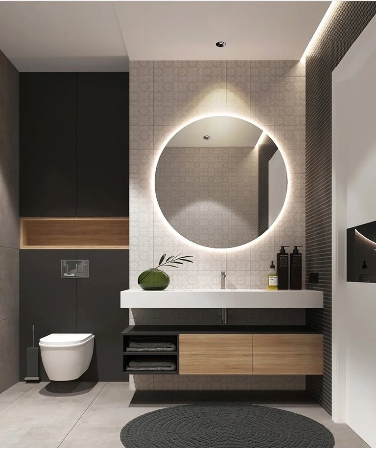 Phòng tắm dùng đèn downlight âm trần và gương hắt sáng
